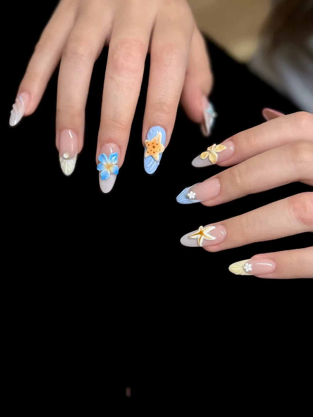 Pastel iridescent Gel-X with hand-painted floral and pearl accents at L2 Nail Salon Mountain View